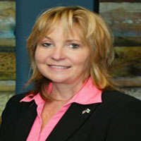 Paula G Reid